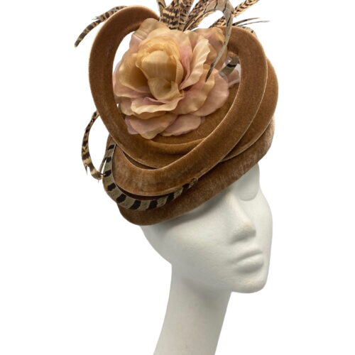 Beige/tan coloured velvet teardrop headpiece with swirl detail and completed with beautiful brown feathers.